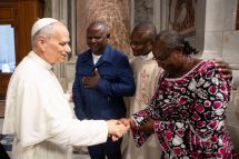 Father Claude Menounga Ngono, his parents and Pope Leo XIV soon after his ordination on June 27, 2025.