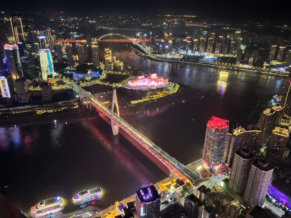 Jiefangbei by night. Jiefangbei by night.