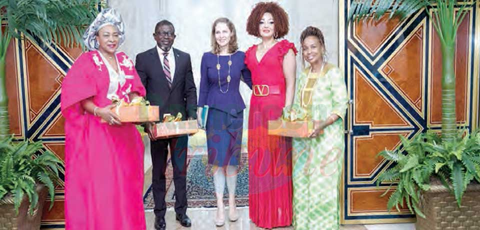 The First Lady of Cameroon, hand-in-hand with Her Royal Highness, Princess Sarah Zeid of Jordan.