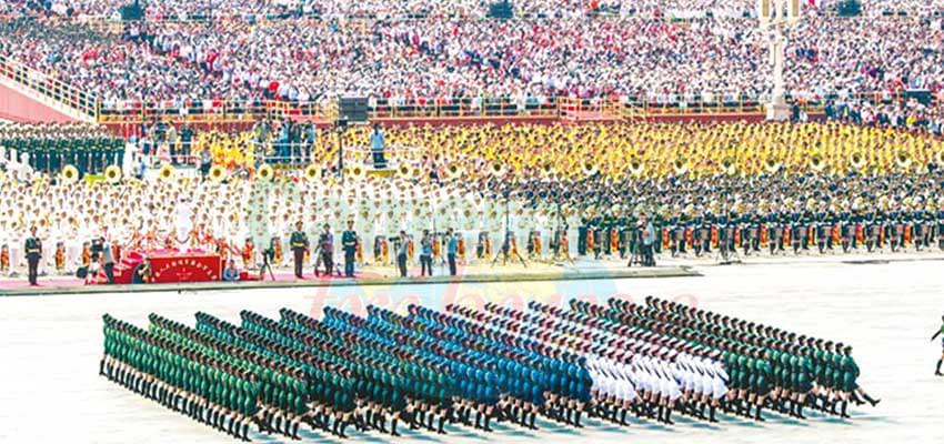 Chinese celebrating through a parade 70 years of achievements.