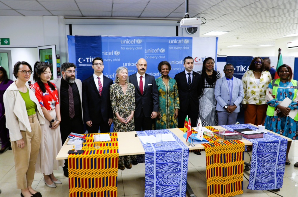 The stones are heavy, but the hands lifting them are many and the grip is firm.