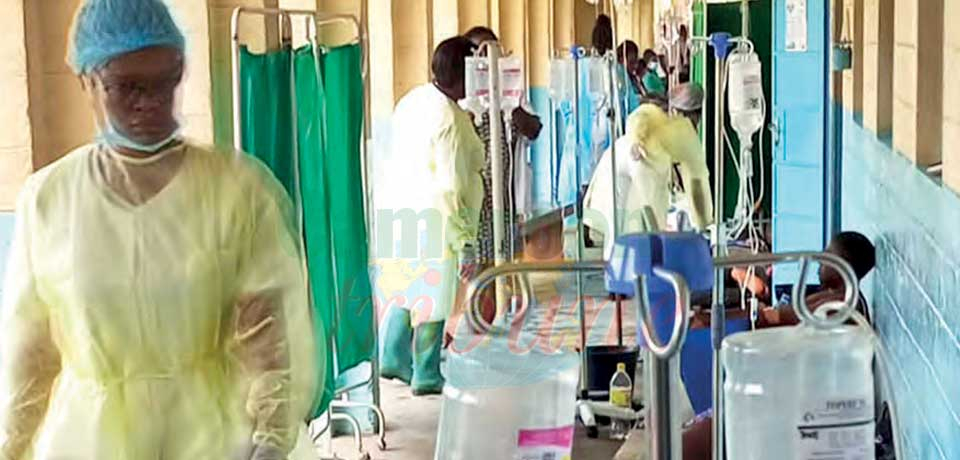 Hospital beds are overloaded, causing treatment to be administered on the verandas.