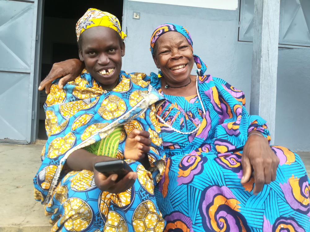 Rabyatou’s newfound joy is shared by her aunt-caregiver, Haram Koulsoumi (right).