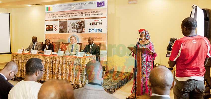 Minister Mbah Acha Rose (talking at the microphone) preaching the advantages of financial accountability. Minister Mbah Acha Rose (talking at the microphone) preaching the advantages of financial accountability.
