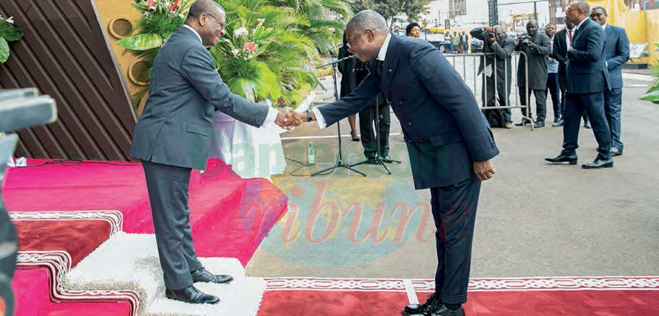 The Secretary General, Séraphin Malgoire Fouda greeting the Prime Minister.