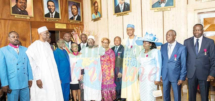 House Speaker immortalise the medal award ceremony with the recipients.