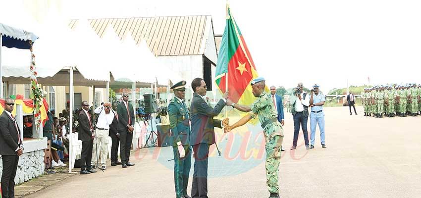The Commander of the Cameroonian 5th Contingent to MINUSCA returning the flag. The Commander of the Cameroonian 5th Contingent to MINUSCA returning the flag.