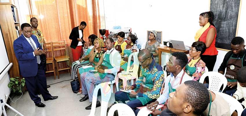 Baristas at opening ceremony eager to learn new coffee brewing techniques.