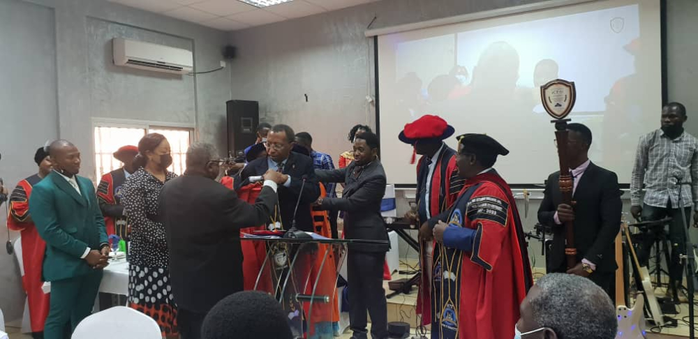 A solemn ceremony to confer Prof. Jean-Emmanuel Pondi with his new title. A solemn ceremony to confer Prof. Jean-Emmanuel Pondi with his new title.